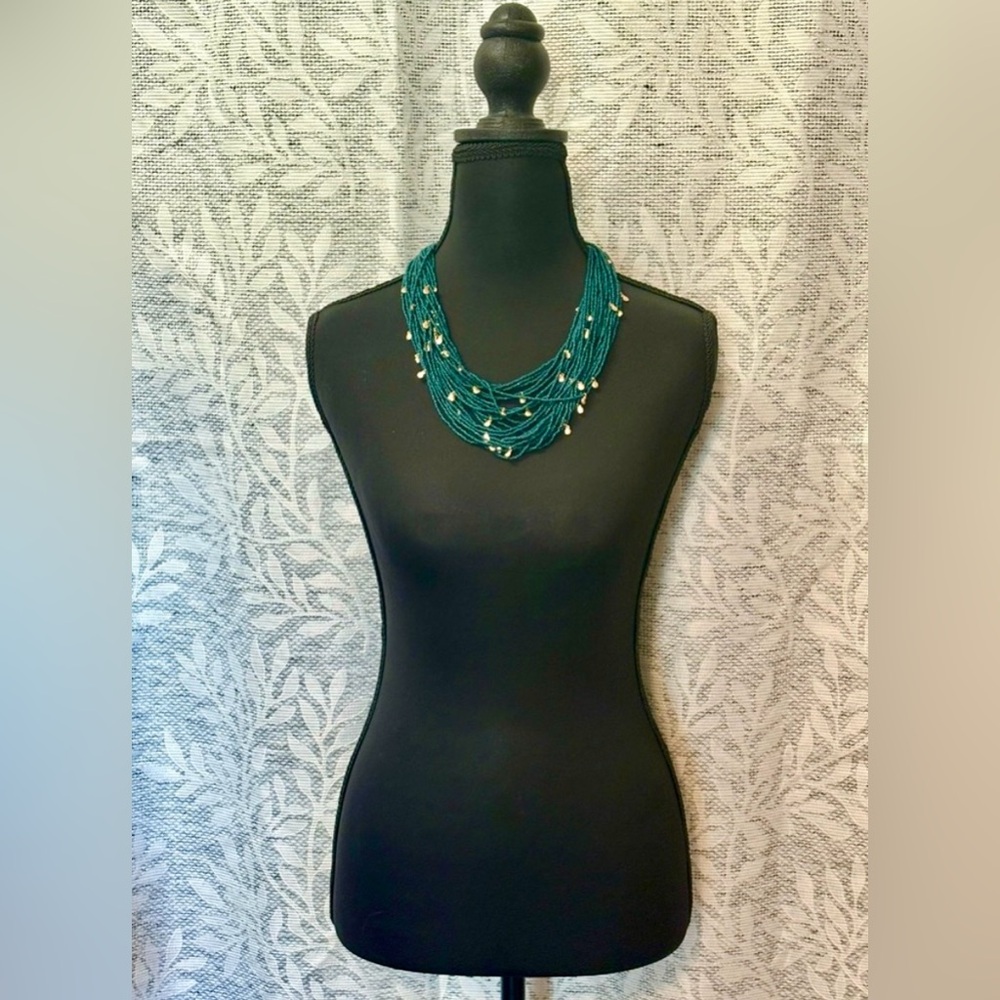 Handmade Green Multi-Strand Necklace with Gold Accents and Rhinestone End